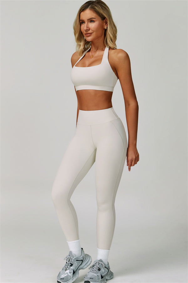 Conjunto de 2 piezas de leggings y sujetador deportivo de cuello halter atrevido