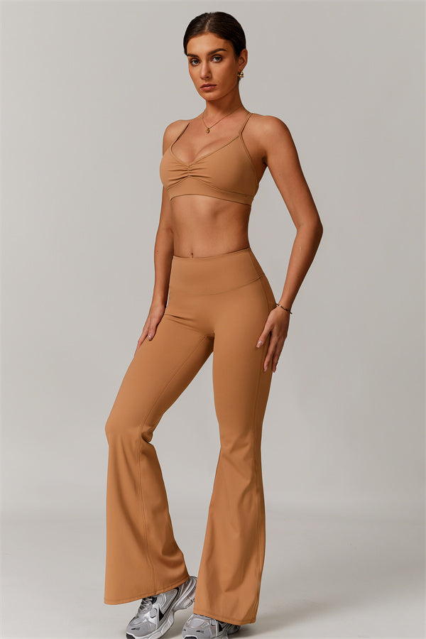 Los leggings delicados de pernera acampanada