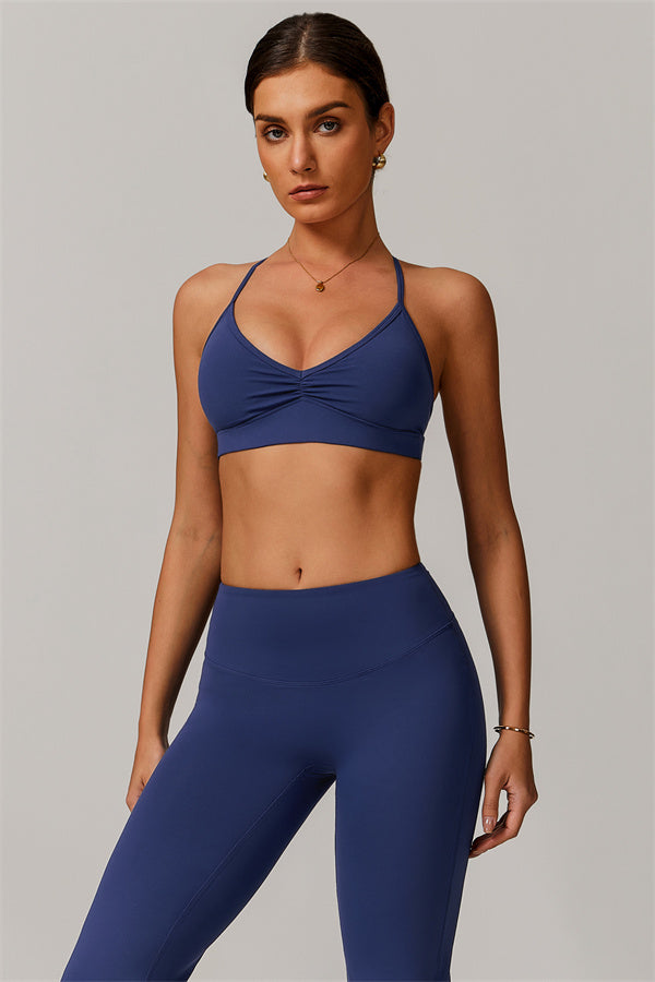 El set de 2 piezas de bralette deportivo delicado y leggings acampanados
