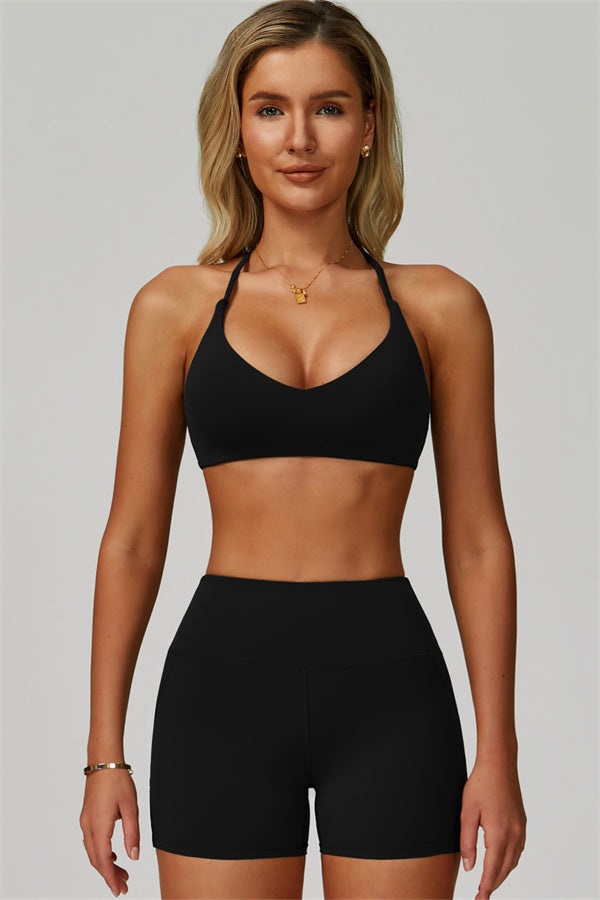 Conjunto de 2 piezas de shorts y top deportivo con espalda cruzada The Bold
