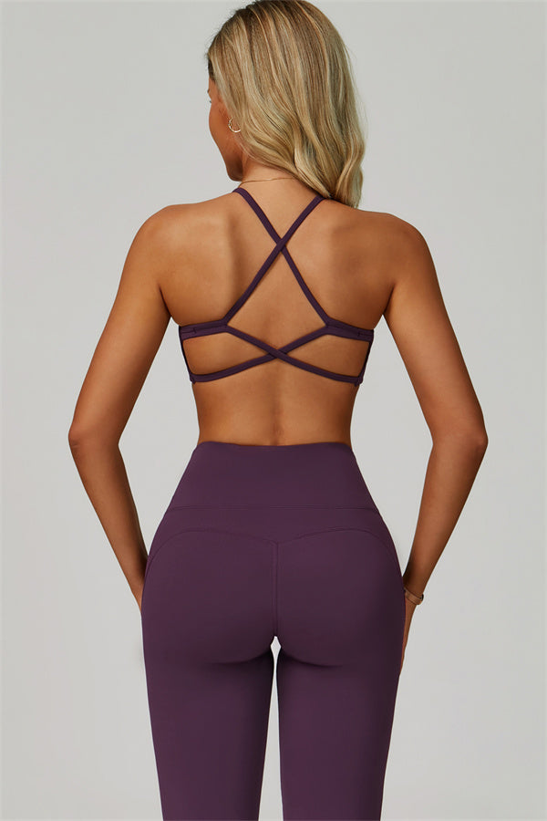 Conjunto de 2 piezas de sujetador deportivo atrevido con espalda cruzada y leggings acampanados