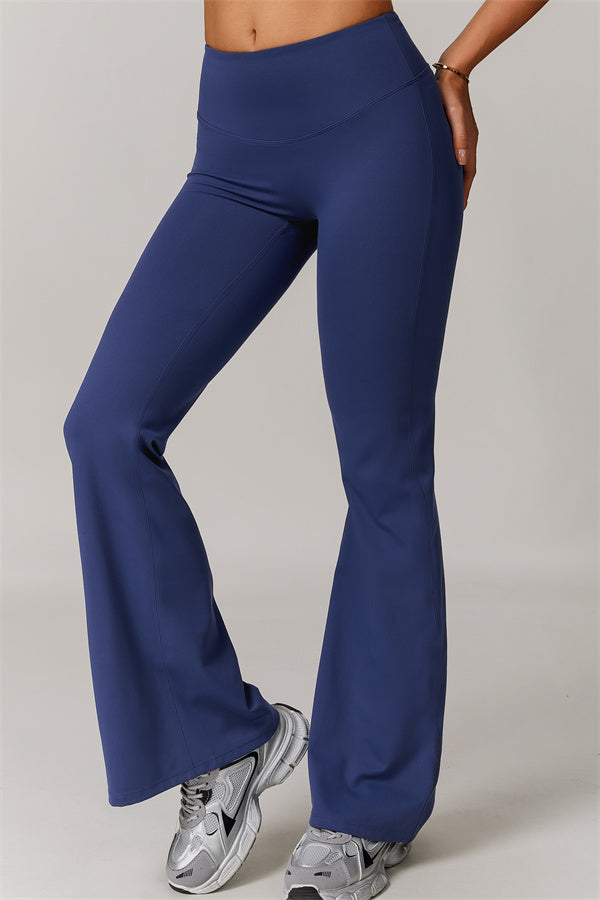 Los leggings delicados de pernera acampanada