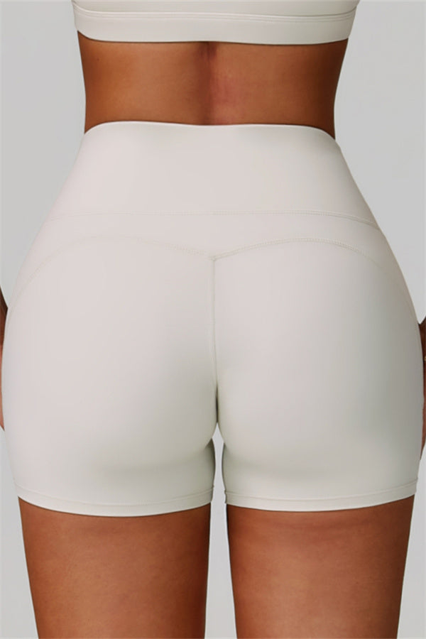 Conjunto de 2 piezas de shorts y top deportivo con espalda cruzada The Bold