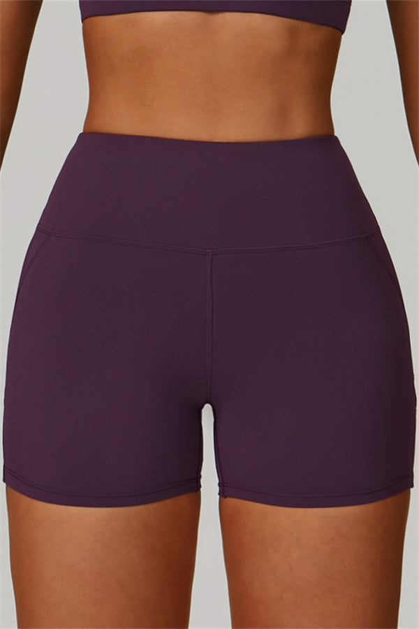 Conjunto de 2 piezas de shorts y top deportivo con espalda cruzada The Bold