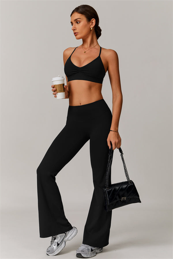 Los leggings delicados de pernera acampanada