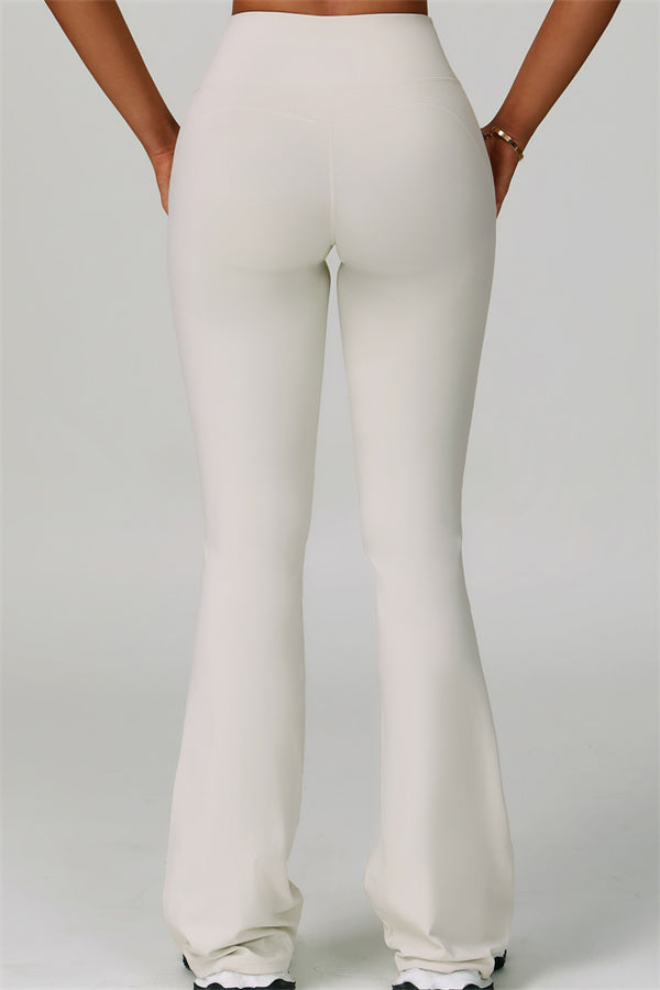 Conjunto de 2 piezas de sujetador deportivo atrevido con espalda cruzada y leggings acampanados