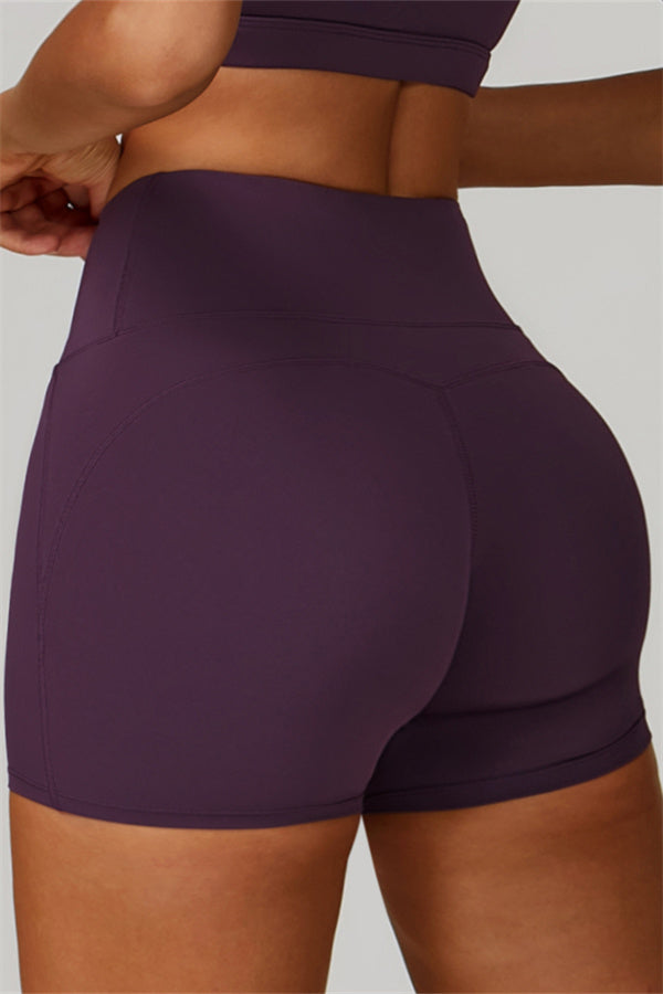 Conjunto de 2 piezas de shorts y top deportivo con espalda cruzada The Bold