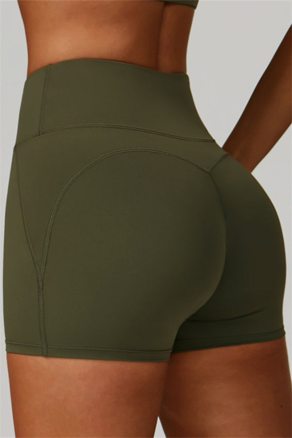 Conjunto de 2 piezas de shorts y top deportivo con espalda cruzada The Bold