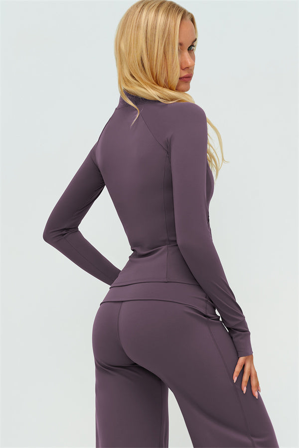 El conjunto de 3 piezas de chaqueta Twirl con cremallera, sujetador deportivo y pantalón de pierna recta