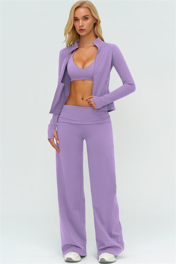 El conjunto de 3 piezas de chaqueta Twirl con cremallera, sujetador deportivo y pantalón de pierna recta