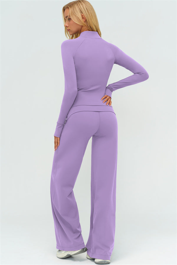 El conjunto de 3 piezas de chaqueta Twirl con cremallera, sujetador deportivo y pantalón de pierna recta