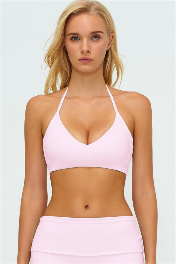 El conjunto de 3 piezas de chaqueta Twirl con cremallera, sujetador deportivo y pantalón de pierna recta