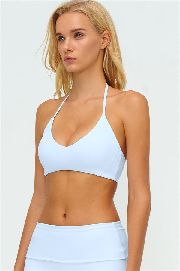 El conjunto de 3 piezas de chaqueta Twirl con cremallera, sujetador deportivo y pantalón de pierna recta
