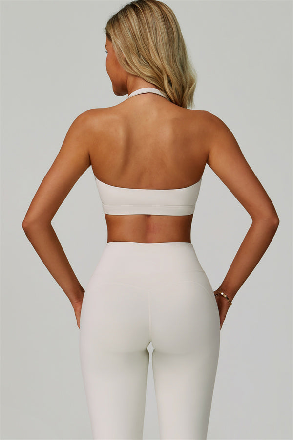 Conjunto de 2 piezas de sujetador deportivo halter atrevido y leggings acampanados