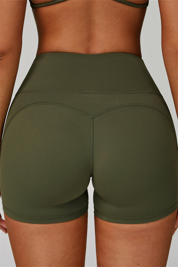 Conjunto de 2 piezas de shorts y top deportivo con espalda cruzada The Bold