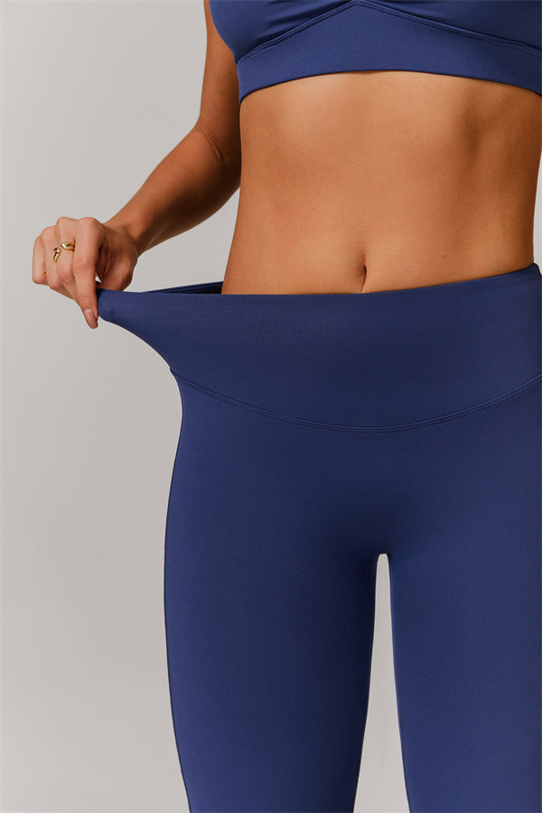 Los leggings delicados de pernera acampanada