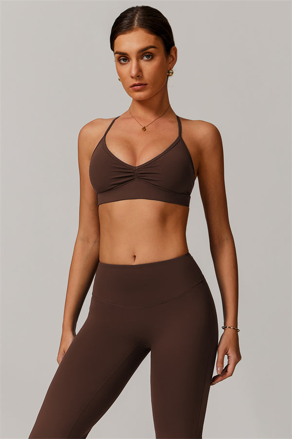 El set de 2 piezas de bralette deportivo delicado y leggings acampanados