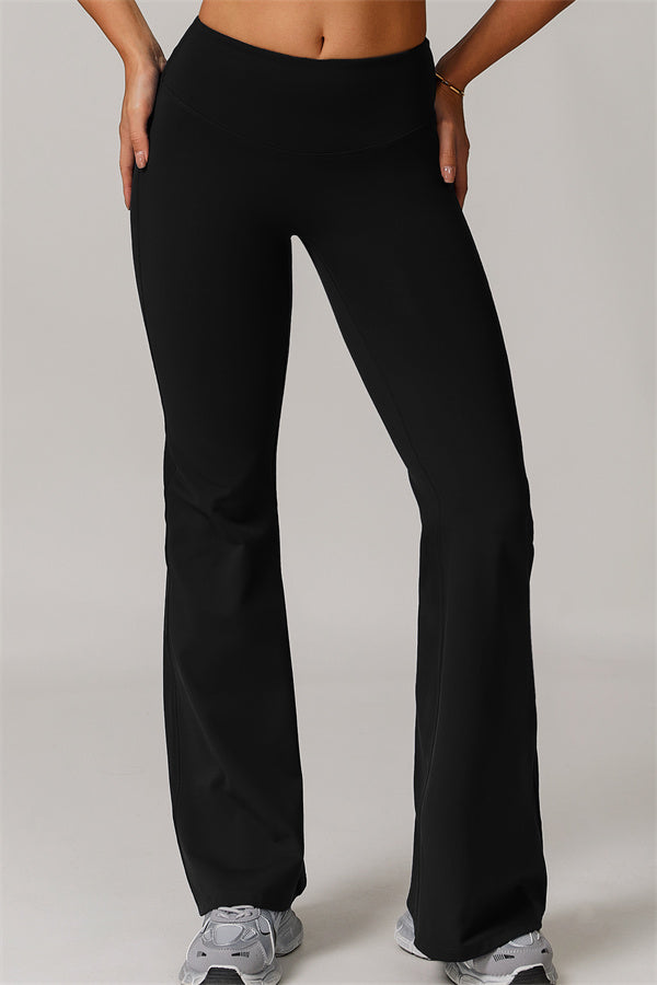 Los leggings delicados de pernera acampanada