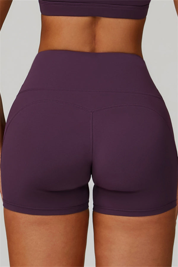 Conjunto de 2 piezas de shorts y top deportivo con espalda cruzada The Bold