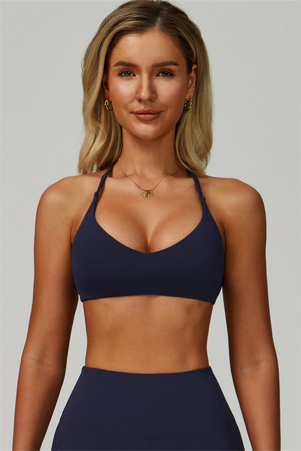 Conjunto de 2 piezas de shorts y top deportivo con espalda cruzada The Bold