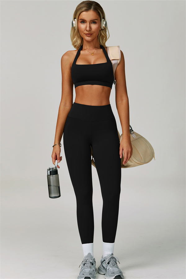 Conjunto de 2 piezas de leggings y sujetador deportivo de cuello halter atrevido