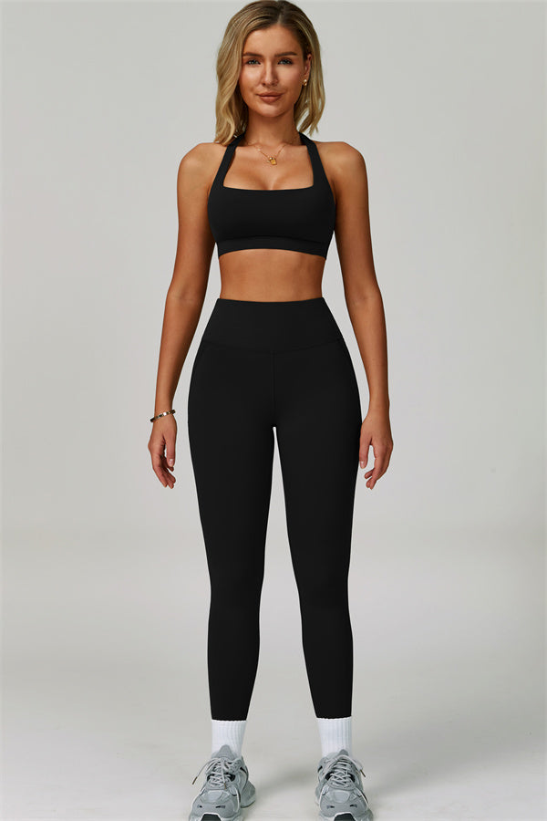 Conjunto de 2 piezas de leggings y sujetador deportivo de cuello halter atrevido