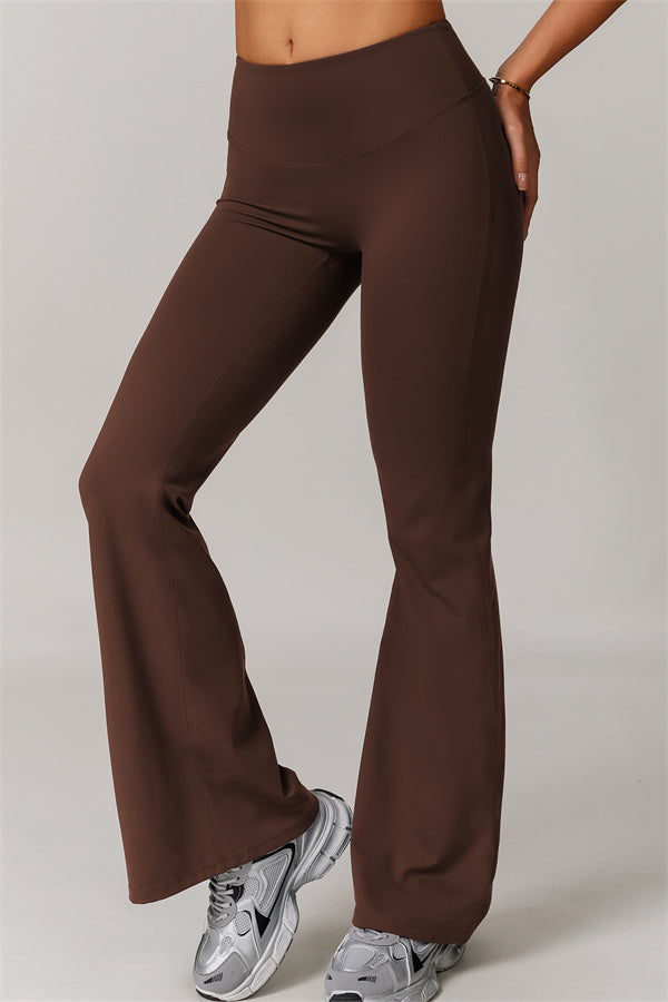 Los leggings delicados de pernera acampanada