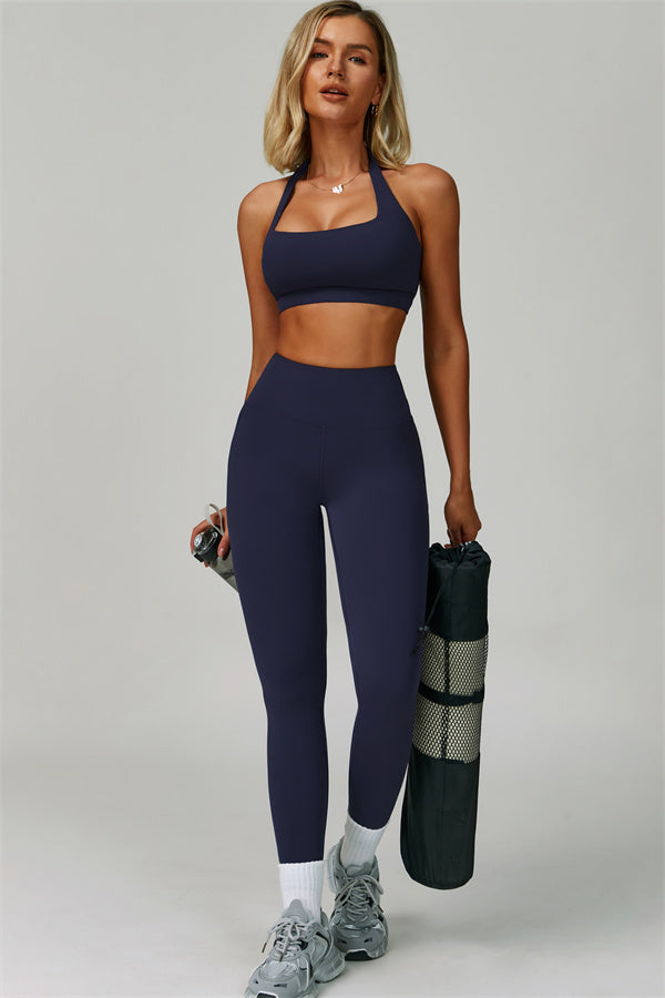 Conjunto de 2 piezas de leggings y sujetador deportivo de cuello halter atrevido